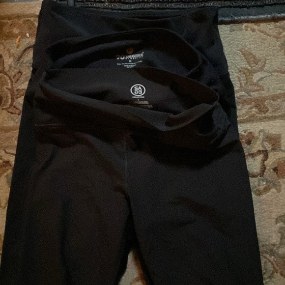 Bundle of 4 black skinny legged yoga pants. Used, sizes Medium-Large - Picture 4 of 4